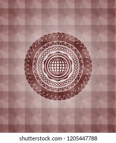 international icon inside red seamless geometric emblem.