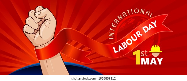 International labour day with a victorious fist and a red background.