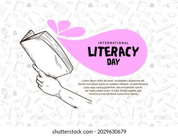 international literacy day with hand holding books isolated on white background