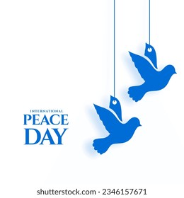 international peace day celebration poster with hanging dove bird vector