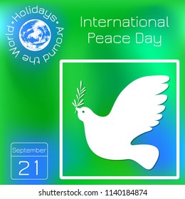 International Peace Day. Concept of a social holiday. White dove with olive branch. Calendar. Holidays Around the World. Event of each day. Green blur background - name, date, illustration