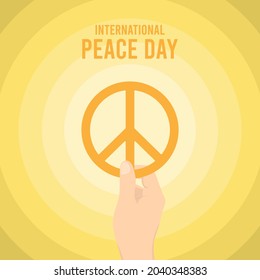 International Peace Day. Hand holding peace symbol. Flat design vector illustration.