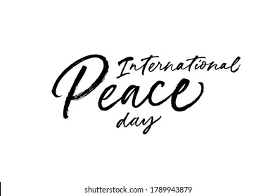 International Peace Day hand written lettering. Hand drawn calligraphy phrase isolated on white background. Lettering of World Peace Day. Holiday calligraphy card, banner, template