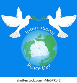 International Peace Day. Planet Earth with birds and branches of tree. Symbol of Peace.