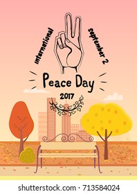 International Peace Day September 2 2017 vector illustration on autumn background. Symbol of peace is hand showing two fingers and surrounded by text