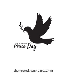 International Peace Day Typographic Design with dove and olive branch. 