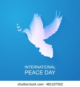 INTERNATIONAL PEACE DAY.Peace dove with olive branch for International Peace Day poster.