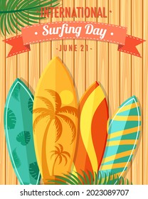 International Surfing Day font with many surfboards on wooden background illustration