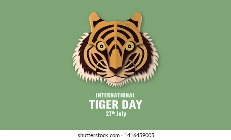 International tiger day with face and number. Vector illustration in paper cut and craft style.