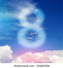 International Women's Day, 8 March. Smooth Spring Blue Sky with Clouds, Blurred Digit 8 and Label for Holiday Design. Abstract Background.