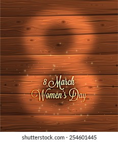 International Women's Day, 8 March. Wooden Background, Blurred Digit 8 and Label for Holiday Design.