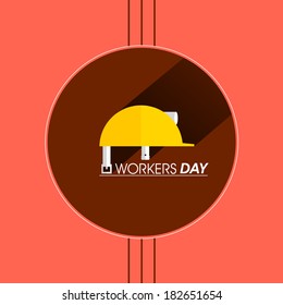 International workers day concept with helmet on creative abstract brown and pink background. 
