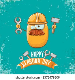 International workers day or labour day greeting card . vector funny cartoon brown smiling worker potato with engineer helmet holding hammer and wrench isolated on grunge background. Mayday poster