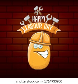 International workers day or labour day greeting card . vector funny cartoon brown smiling worker potato with engineer helmet holding hammer and wrench isolated on brick wall background. Mayday poster