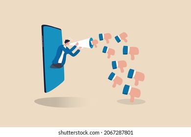 Internet Hater, Angry Social Media, Dislike Or Negative Feedback From Remote Work, Cyber Bullying Concept, Furious Young Man From Mobile Phone Shouting On Megaphone With Negative Thumb Down Symbols.