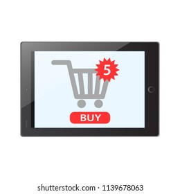 Internet shopping concept. Buy button on tablet. Five items in shopping cart. E-commerce concept. Shopping online.