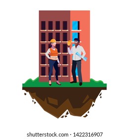 interracial couple of builders workers with building