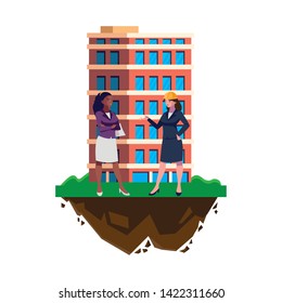 interracial female engineers workers with building
