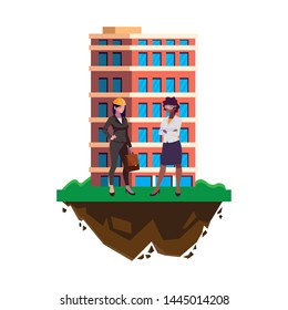 interracial female engineers workers with building