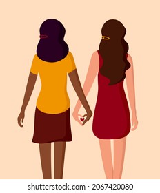 Interracial lesbian couple. Young women holding hands. The LGBT community and the concept of love.