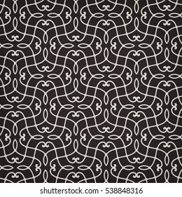 Intersecting curved elegant fine lines and scrolls forming abstract floral ornament. Seamless pattern for background, wallpaper, textile printing, packaging, wrapper, etc. 