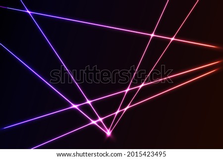 Intersecting glowing laser  security  beams on a dark background.Art design shine light ray.Laser field.