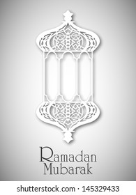 Intricate arabic lantern on abstract yellow background for holy month of muslim community Ramadan Kareem.