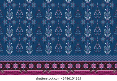 An intricate batik design featuring a repeating geometric pattern in dark blue and gold. This traditional artwork showcases detailed craftsmanship with a blend of cultural motifs and symmetrical layou