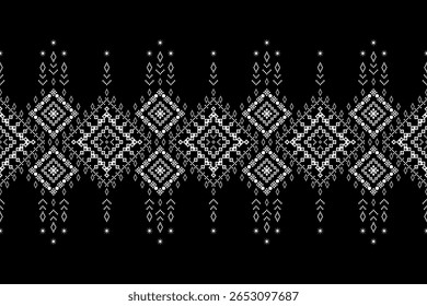 Intricate monochrome black and white ethnic pixel border pattern with geometric diamond ,dangling motifs. Ideal for tribal-inspired garment trims, textile accents,cultural decorative elements,fabric
