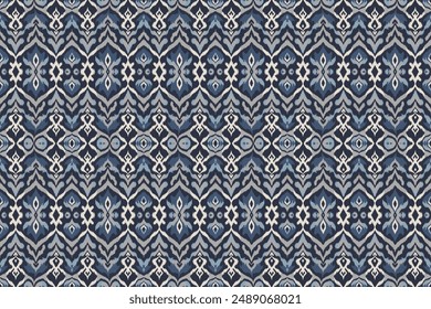 Un patrón intrincado que combina tonos de azul y blanco, con diseños detallados y simétricos en un formato repetitivo.
