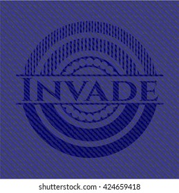 Invade emblem with denim high quality background