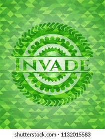Invade green emblem with mosaic background