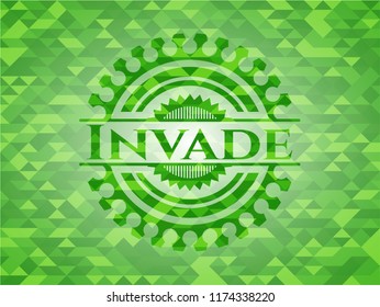 Invade green emblem with triangle mosaic background