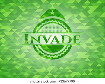 Invade green emblem with triangle mosaic background