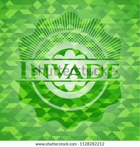 Invade green emblem with triangle mosaic background