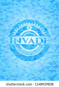 Invade light blue emblem with triangle mosaic background