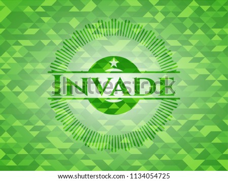 Invade realistic green emblem. Mosaic background