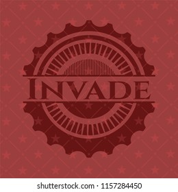 Invade red icon or emblem