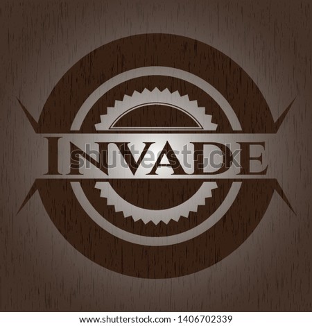 Invade wood icon or emblem. Vector Illustration.