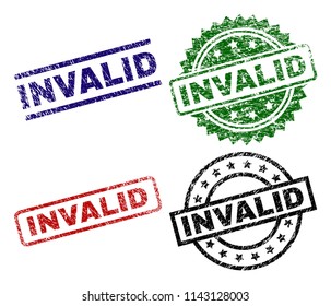INVALID seal prints with distress style. Black, green,red,blue vector rubber prints of INVALID tag with grunge style. Rubber seals with round, rectangle, medallion shapes.