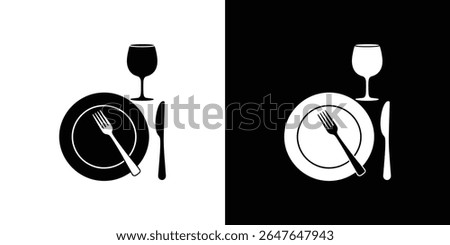 Inverted-color illustration showcases a place setting with a plate, fork, knife, and wine glass. The background transitions from white to black, reversing the foreground's tones.