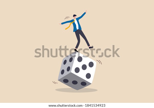 Investment risk, stock trader, gambling,\
uncertainty, possibility of losing money or make a profit from\
investment concept, greedy investor man dare trying to balance\
himself on spinning unstable\
dice