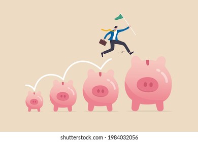 Investment and savings growth, salary or profit increase, making more money and collect more wealth concept, business man jumping from small piggy bank to bigger profit to achieve financial goal.