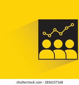 investor monitoring stock chart on board with drop shadow on yellow background