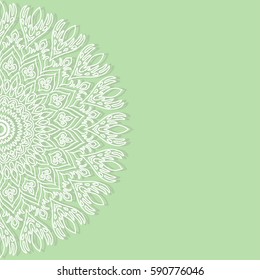 Invitation card. Abstract decorative round ornament on green. Vector design element. Natural, weave, floral motifs.