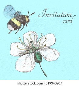 Invitation card with bumblebee and cherry flower on a blue background