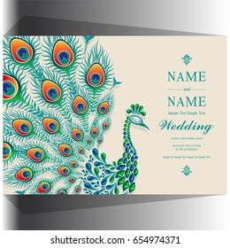 Invitation card templates with peacock patterned and crystals on paper color.