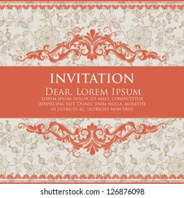 Invitation or wedding card with damask background and elegant floral elements.