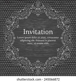 Invitation or wedding card with elegant floral and abstract elements.