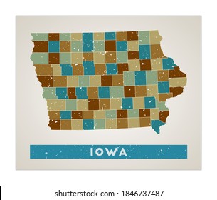 Iowa map. Us state poster with regions. Old grunge texture. Shape of Iowa with us state name. Captivating vector illustration.
